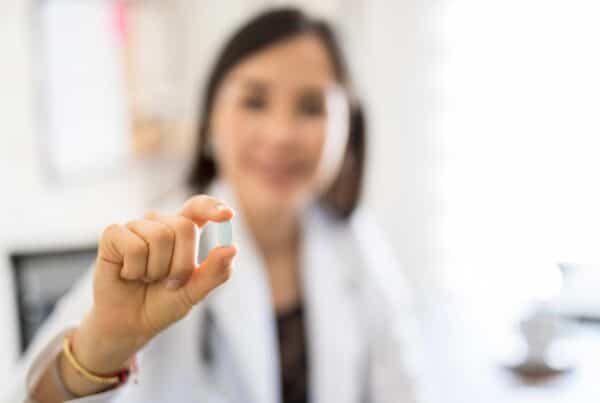 The G037 white oblong pill contains hydrocodone 10 mg and acetaminophen 325 mg, prescribed for moderate to severe pain relief.