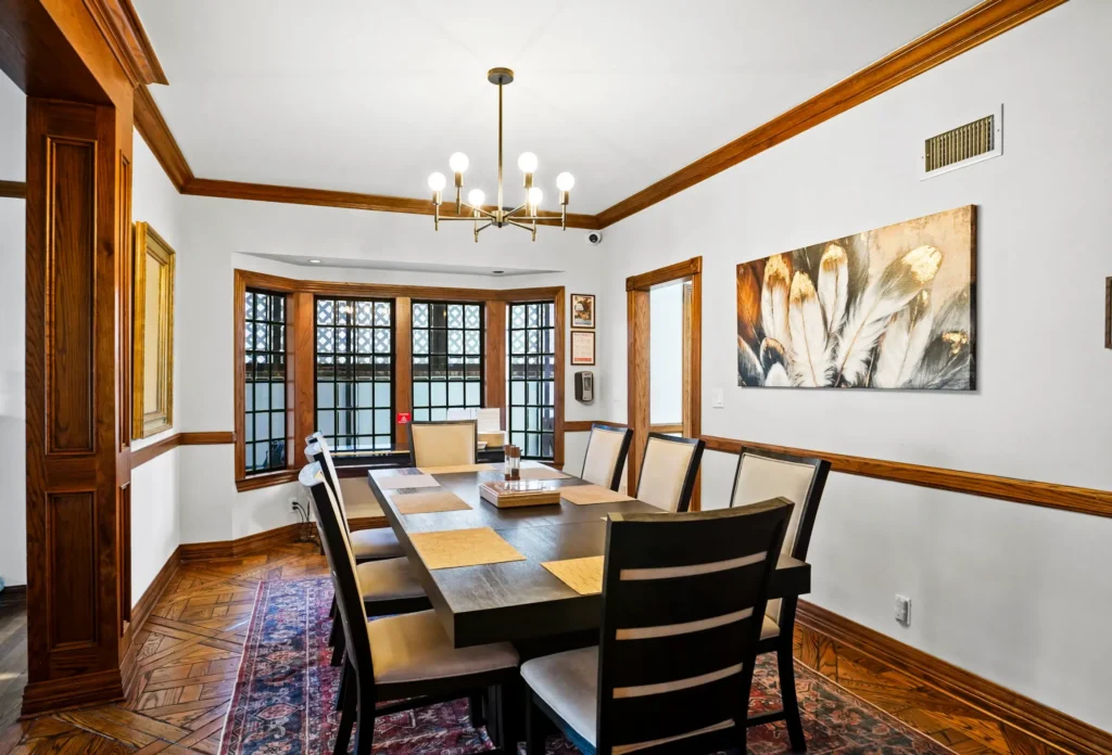 iRely Recovery Facility — Dining Room iRely Recovery formal dining room with chandelier for community meals