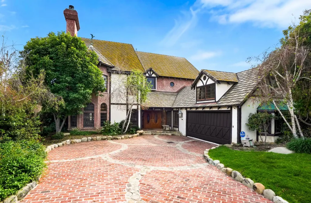 iRely Recovery Facility — Home Exterior iRely Recovery Tudor-style home exterior in Sherwood Forest Los Angeles