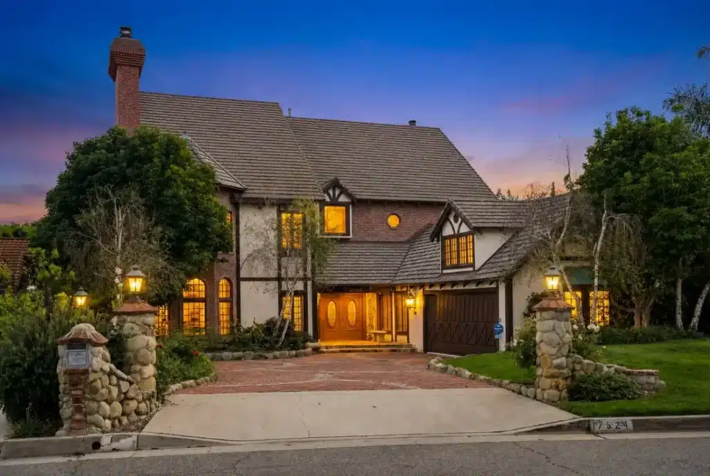 Exterior of the Tudor-style iRely Recovery house in Northridge, Los Angeles at dusk